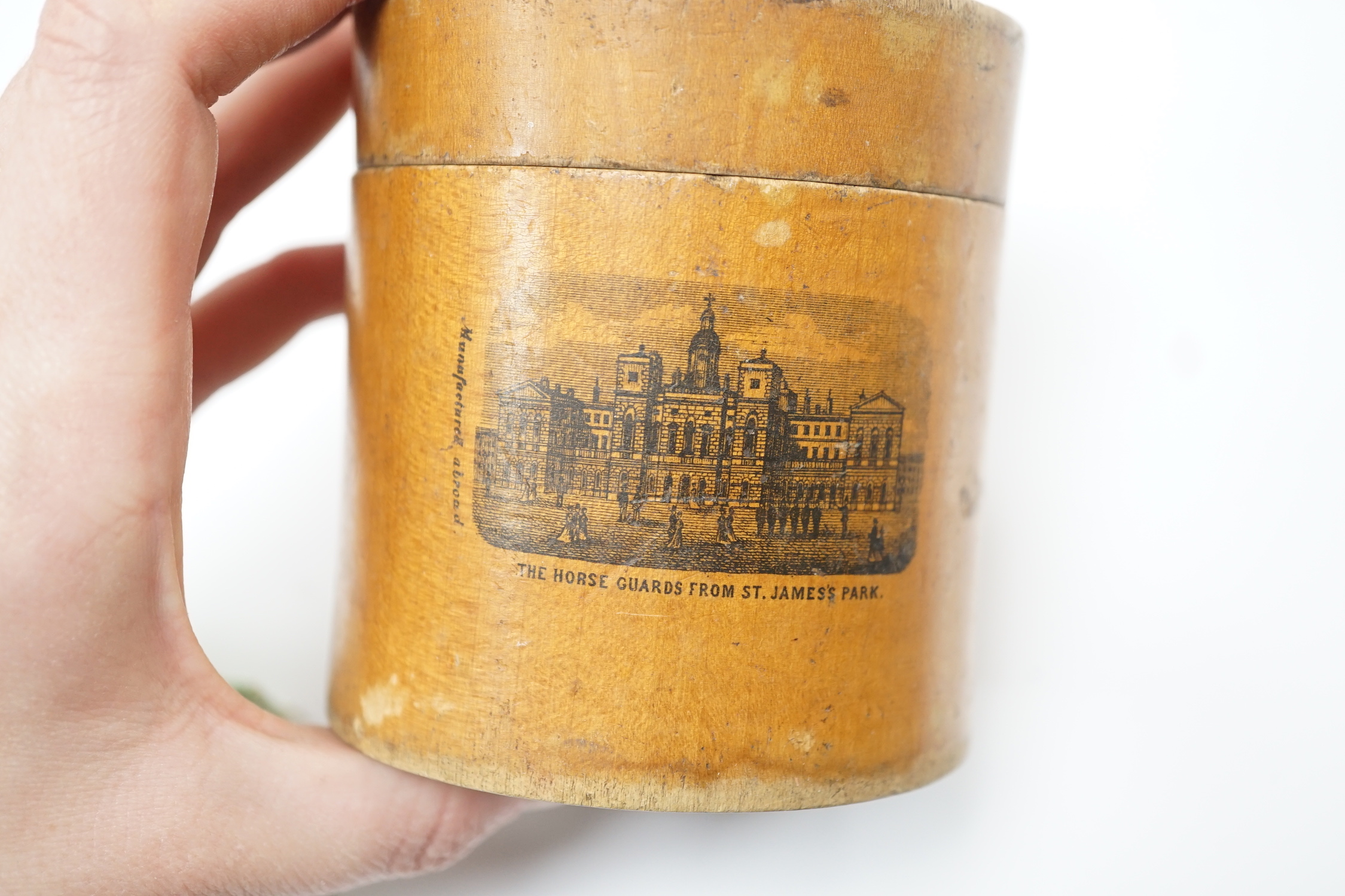 A brass inkwell, a treen box and a sealing wax set
